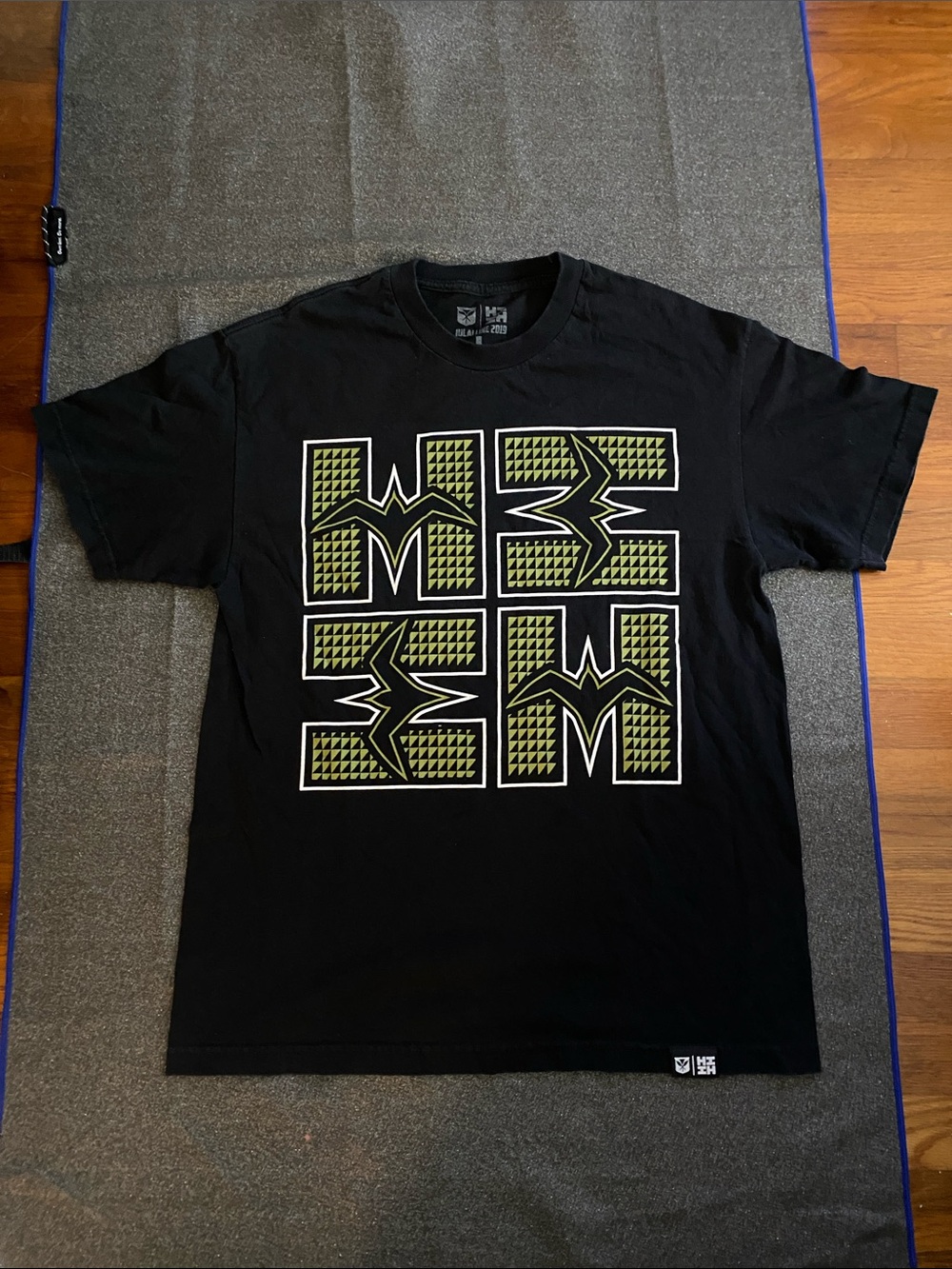Helly Hansen Black Tee with Neon Yellow Geometric Logo